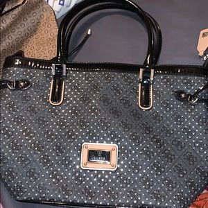 Guess black with good under neath purse